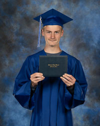 20260603-CapNGown-Comeau_Tyler-Magnet.jpg